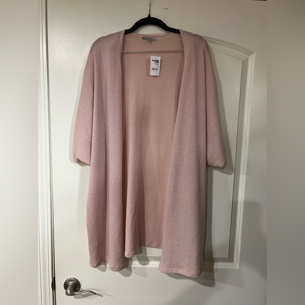Brand new light pink cardigan sweatshirt. Short sleeve. Size large.